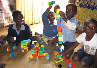FKC children making a lego tower